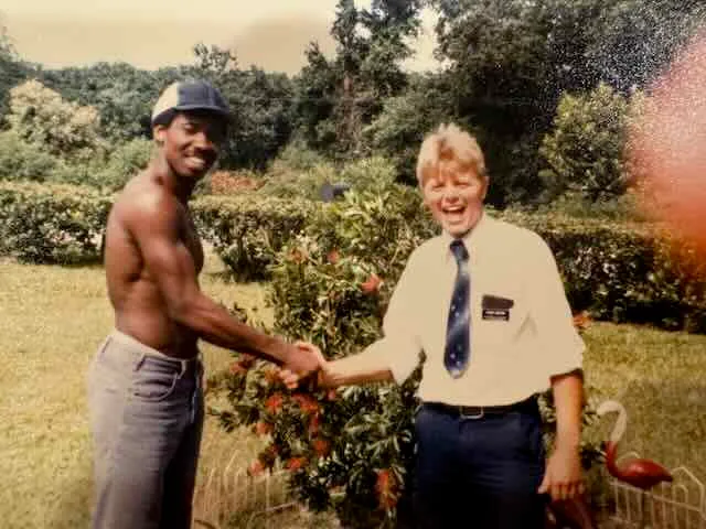 Tracy Watson as a missionary, shaking hands with man in Florida